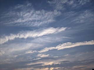 Fototapeta na wymiar 夕焼けの青い空と白い雲