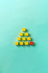 Business material, pyramid-shaped block. Society, organization, strategy, top-down, basics, etc....