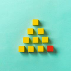 Business material, pyramid-shaped block. Society, organization, strategy, top-down, basics, etc....