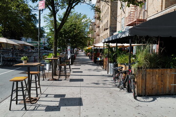 Sept 11, 2020 Outdoor dining at Dyckman Street, Inwood, New York City after re-opening from...