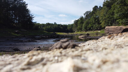 Rocky close up with reservoir in the background