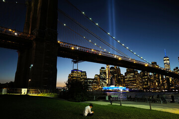 Sept 11, 2020  9/11 Memorial Lights overlooking from Brooklyn Bridge, New York City, USA.