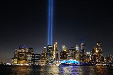Sept 11, 2020 9/11 Memorial lights looking from Brooklyn after lockdown from Covid-19, New York City, USA. - obrazy, fototapety, plakaty