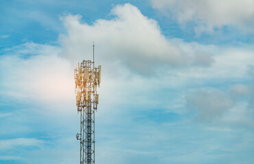 Telecommunication tower with blue sky and clouds. Antenna. Radio and satellite pole. Communication technology. Telecommunication industry. Mobile or telecom 5g network. Telecommunication industry.