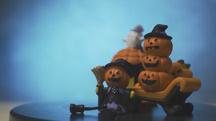 Concept Halloween Pumpkins. Pumpkin doll and friends enjoy and happy the night of Ghost Festival. for horror holiday decoration. Copy space