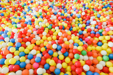 Colorful balls for playing - Inside the beautiful kids playground ball colored plastic of game room