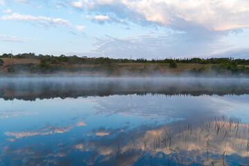 Fototapeta premium beautiful calm lake at sunrise