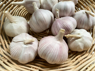 garlic cloves in the wicker basket