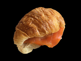 Smoked Salmon Croissant Sandwiches isolated on black background
