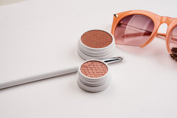 professional eyeshadow on isolated background and makeup brushes cosmetics fashion