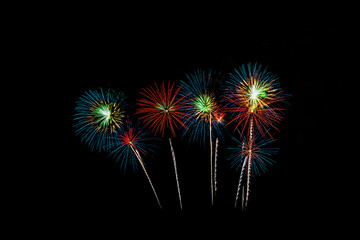 Colorful fireworks on black background.