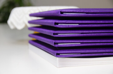 Purple file on the table in the conference room