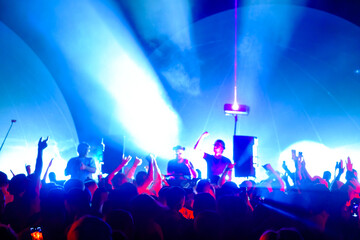 DJs engaging crowd during party