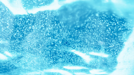 Ice background tint blue. Winter Christmas background. Blurring