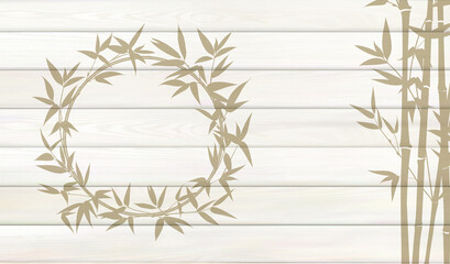 Bamboo background for your design. Tropical leaves on wooden background with empty space.