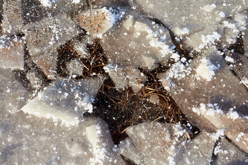 Ice hummock on Frozen River in winter sunny day. Sparkling ice texture or background.