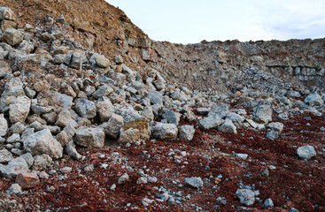 textures of various clay layers underground in  clay quarry after  geological study of  soil. colored layers of clay and stone in  section of  earth, different rock formations and soil layers.
