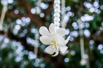Floral arrangement at a wedding ceremony.
