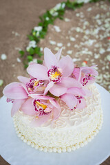Obraz na płótnie Canvas Wedding Cake with Flowers on Top.