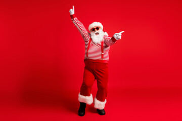 Full length body size view of his he nice handsome attractive cheerful cheery ecstatic Santa...