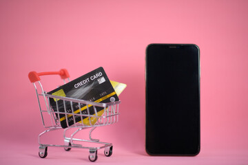 shopping cart with credit card ,smartphone ,shopping online concept
