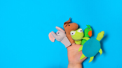 Small children's hand and finger toys animals: elephant, deer, frog. parrot and turtle. Fingers Theatre