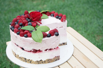 Home made cheese cake with organic fruit. Cake decoration. Food photography.