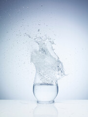 Exploding water balloon on the vase