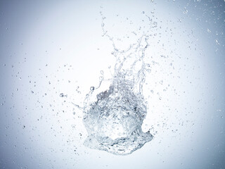 Exploding water balloon on white background