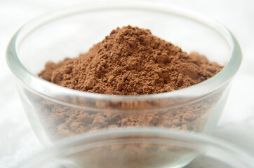 cocoa powder in a glass bowl