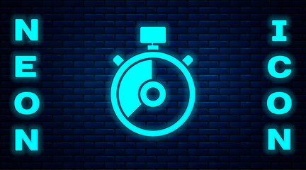 Glowing neon Stopwatch icon isolated on brick wall background. Time timer sign. Chronometer sign. Vector Illustration.