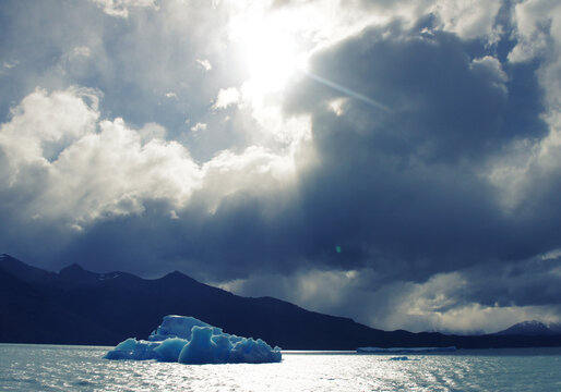 Lonely floating iceberg on the way to Perito Moreno glacier in Patagonia, Argentina. Global warming effect. Environment protection. Inspirational image. Copy space for the text. 