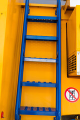 ladder to climb into the tractor