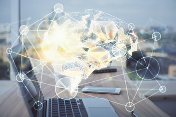 Multi exposure of work space with computer and human brain hologram. Brainstorm concept.