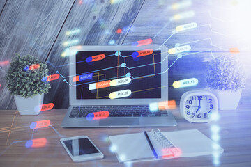 Double exposure of computer and technology theme hologram. Concept of freelance work.