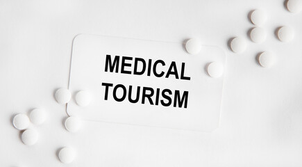 On the card is the inscription MEDICAL TOURISM, next to the stethoscope.