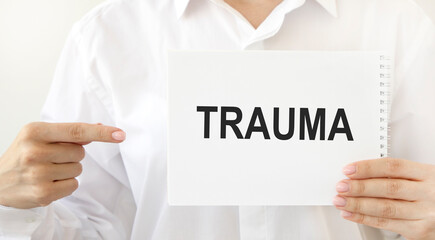 The inscription on TRAUMA, next to the neatly decomposed tablets.