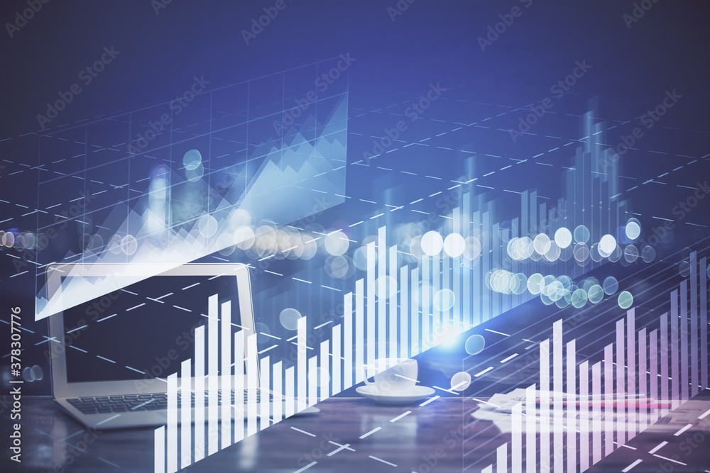 Wall mural forex chart hologram on table with computer background. multi exposure. concept of financial markets