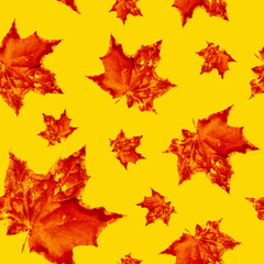 golden autumn watercolor maple leaves seamless pattern on yellow background