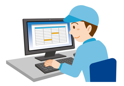 パソコン作業をする帽子をかぶった青い作業服の男性