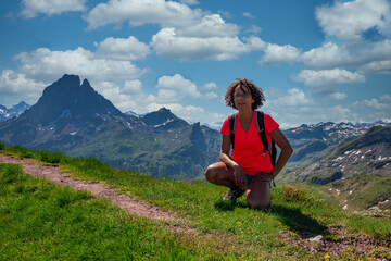 Fototapeta na wymiar hiker woman with Pic du Midi Ossau in the french Pyrenees
