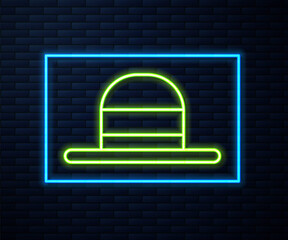 Glowing neon line Elegant women hat icon isolated on brick wall background. Vector.