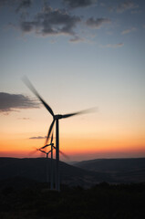 windmills at sunset