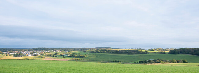 Naklejka premium village in landscape of german eifel in summer