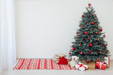 Christmas tree with gift decor pine on new year interior background postcard holiday winter