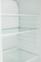 Broken fridge. defrosted refrigerator. Open freezer