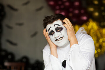 Man in Halloween costumes at the Halloween Party. 