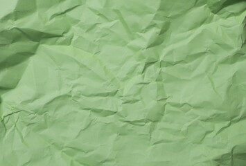 Fototapeta premium Crumpled green color background texture