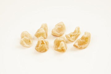 Alma candy isolated on white background, close up 