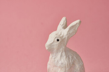 Easter bunny on a pink background toy animal holidays